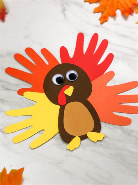 A Colorful And Cute Turkey Handprint Craft For Kids