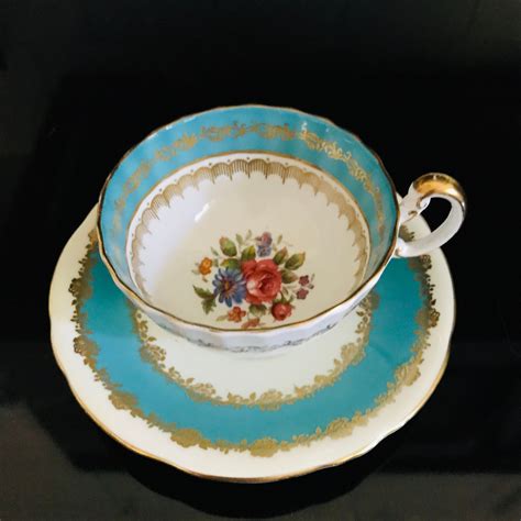 Aynsley Tea Cup And Saucer Turquoise Blue Floral Center Pattern Fine