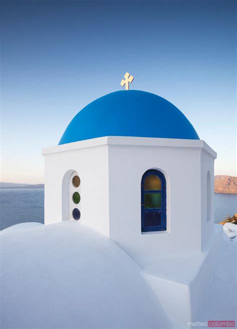 Matteo Colombo Travel Photography Blue Domed Church In Oia Santorini
