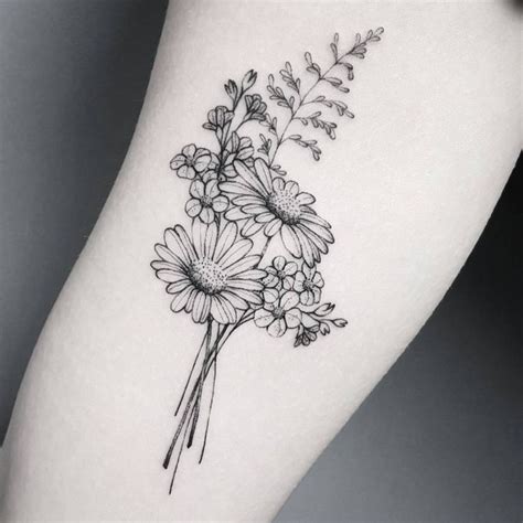 Pin By Z Katun On Tattoo Tattoos Bouquet Tattoo Daisy Flower Tattoos