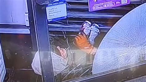 Watch Shoplifter Drinks Beer After Getting Trapped Under Stores