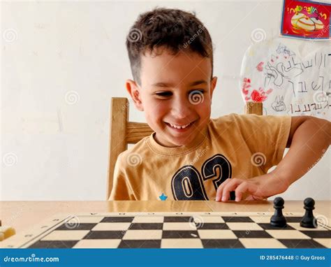 Little Boy Playing Chess At Home Chess Board Game For Kids Stock Photo