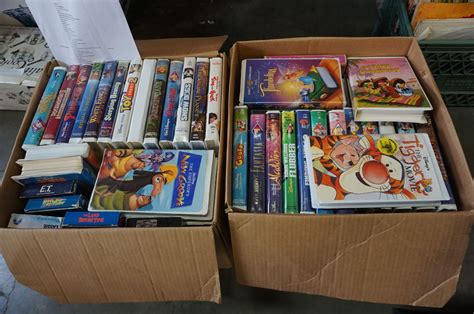 2 Large Boxes Of Disney And Other Vhs