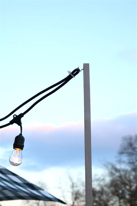 Looking for a good deal on deck pole? How we hung our Deck String Lights, Privacy Screen and ...