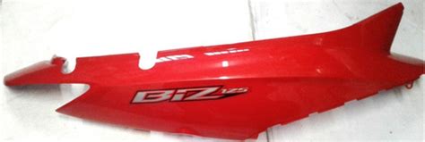 CACHA BAJO ASIENTO IZQ HONDA BIZ 125 C DISCO CENTRO MOTOS Honda