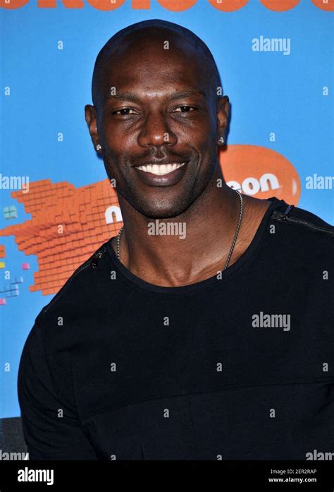 Terrell Owens Walking On The Red Carpet During The 2018 Nickelodeon