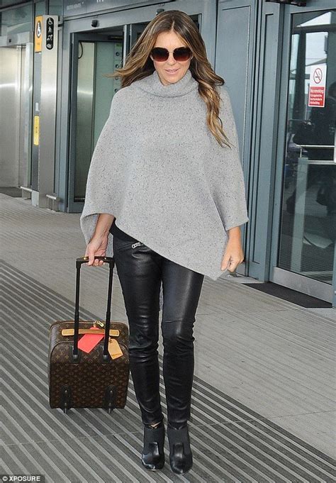 Elizabeth Hurley Stuns In Tight Leather Pants As She Arrives In London