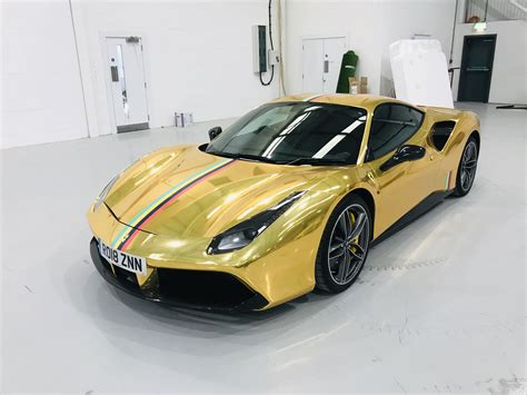 This is a driver's car with minimal storage and a puny cupholder pushed way too forward ahead of the drive selector. Gold Ferrari 488 GTB | Ferrari, Ferrari 488, Car wrap