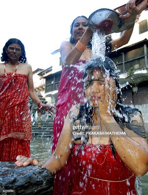 A Nepalese Hindu Woman Takes A Ritual Bath In The Bagmati River News
