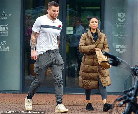 Strictlys Adam Peaty And Katya Jones Share A Laugh While Picking Up
