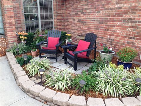 Planning to build a flower bed in front of your house? Pavers in flower bed seating area. (With images ...