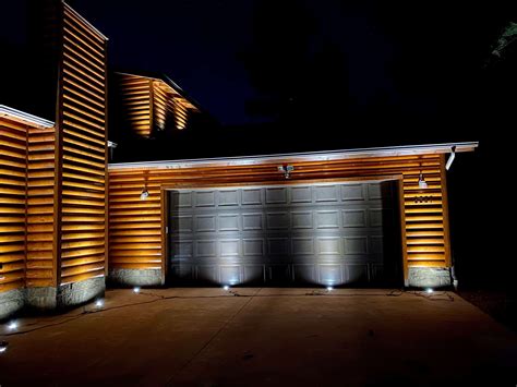 How Architectural Landscape Lighting Can Highlight Your Custom Garage