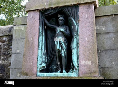 A Bronze In The Dean Cemetery Edinburgh Depicting An Angel Pulling