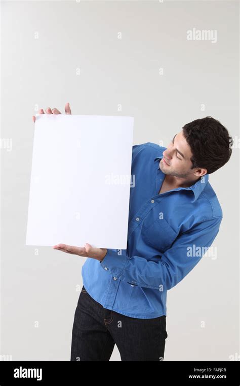 Man Holding Blank Paper Stock Photo Alamy