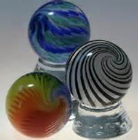 Never saw any peltier marbles with pink but this will be a very rare marble for a common cat eye. Cat's Eye Marbles