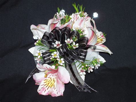 Pink And White Alstroemeria And Waxflower With Black Ribbon Wrist
