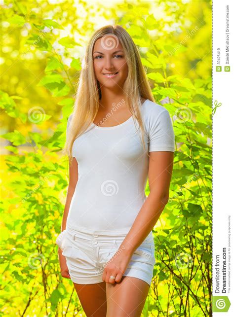 A Beautiful Blonde In A Summer Forest Royalty Free Stock