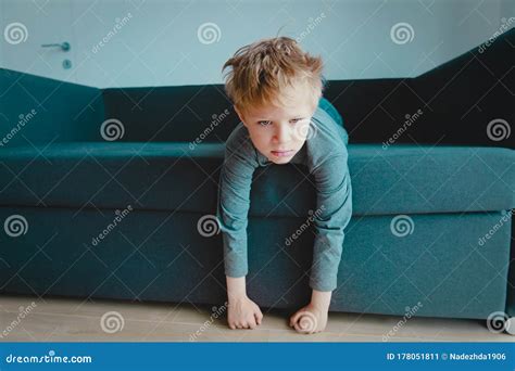 Sad And Stressed Kid Tired And Exhausted Child At Home Stock Image
