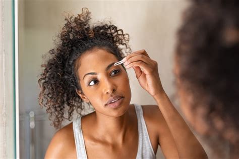 how to groom your curly eyebrows so they do exactly what you want allure