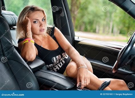 Portrait Of Woman Sitting In The Car Stock Photography Image