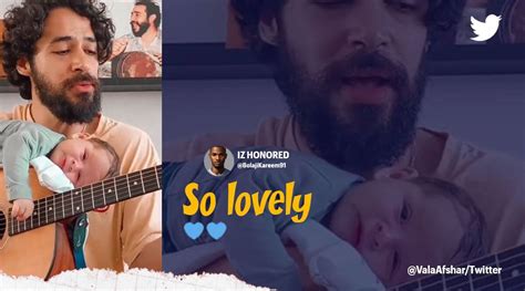 Father Sings A Lullaby To Son Resting On Guitar In Adorable Video