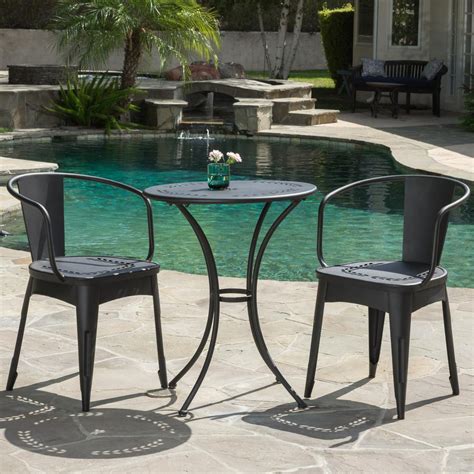 Addition of upholstered bench incorporates a generous helping of casually cool flair. Noble House Lourdes Black Sand 3-Piece Metal Round Outdoor ...