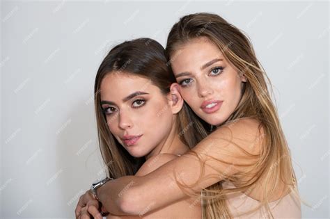 Premium Photo Portrait Of A Two Beautiful Sexy Young Women Hugging Sensual Faces Of Two