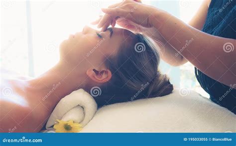 Woman Gets Facial And Head Massage In Luxury Spa Stock Image Image Of Hand Center 195033055