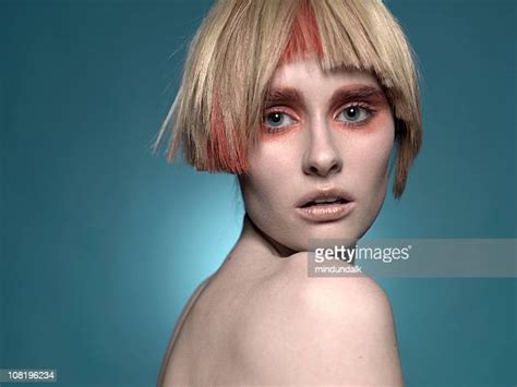 Woman Short Hair Blue Background Photos And Premium High Res Pictures Getty Images