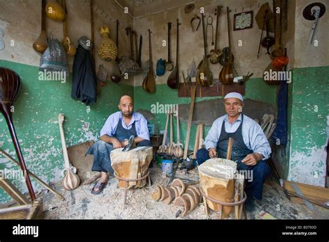 Uyghur Craftsmen Making Traditional Wooden Musical Instruments In