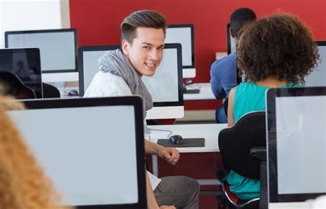 Premium Photo Student Smiling At Camera In Computer Class