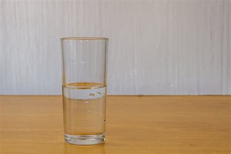 Glass Half Filled With Water Stock Photo Image Of Pessimism Glass