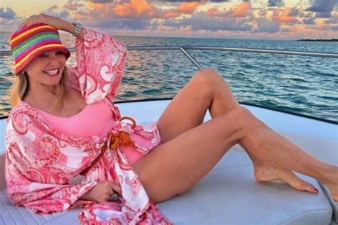 Christie Brinkley Shows Off Her Toned Legs In A Hot Pink Swimsuit