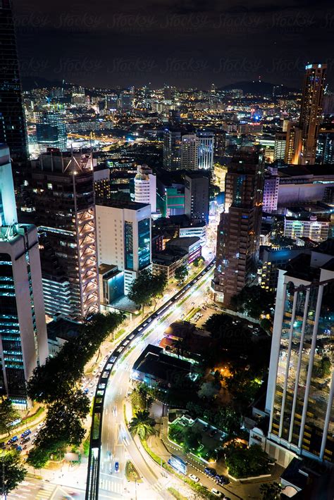 An Overhead View Of A Busy City Street At Night By Stocksy