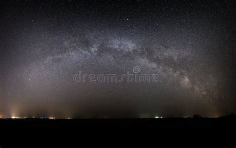 Panoramic View Of The Milky Way Galaxy In The Night Sky With Bright