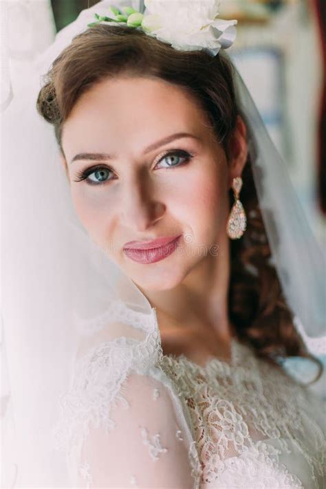 Close Up Portrait Of Happy Smiling Bride In Luxury White Dress And Veil