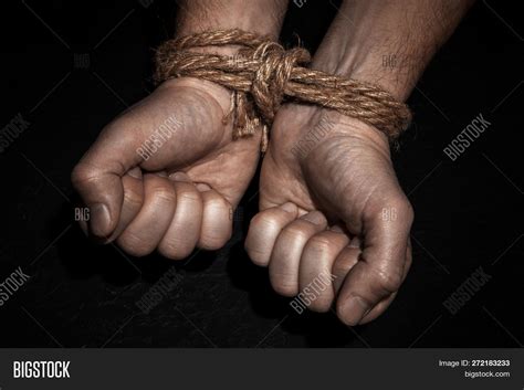 man hands tied rope on image and photo free trial bigstock