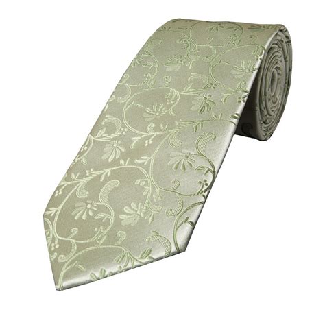 A Light Green Tie With An Ornate Design On It