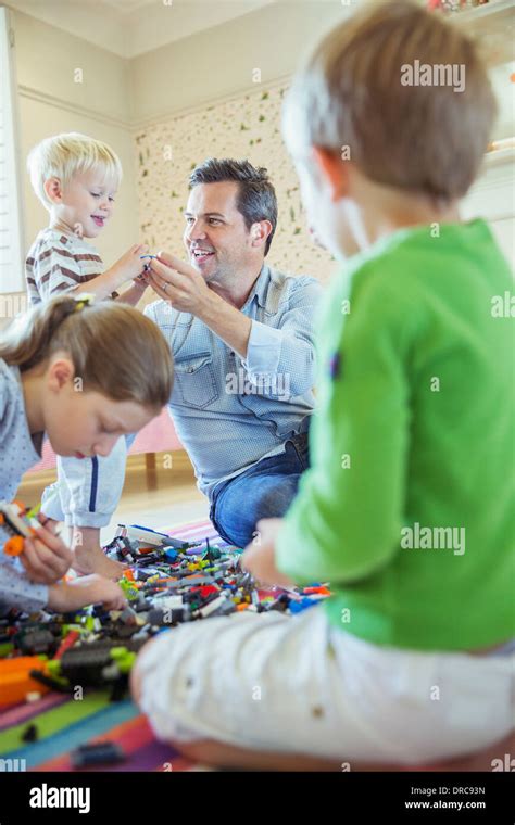 Father Playing With Children Stock Photo Alamy