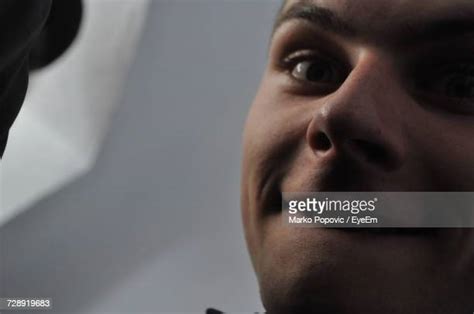 Man Biting Lip Close Up Photos And Premium High Res Pictures Getty Images