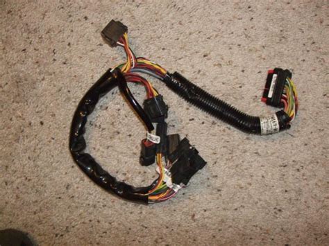 As the name implies, specializes in design and execution of wiring harnesses for appliances, auto electrical and electrical applications. Advanced Audio System Wiring Harness P/N 70169-06 - Harley Davidson Forums