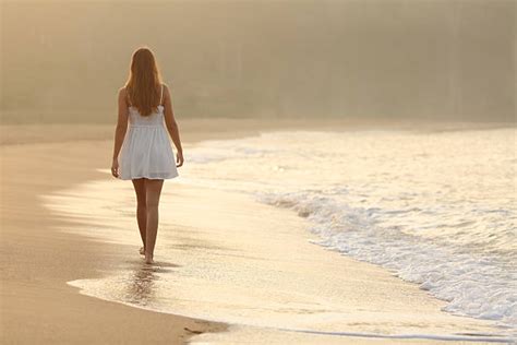 Royalty Free Girl Walking On Beach Alone Pictures Images And Stock