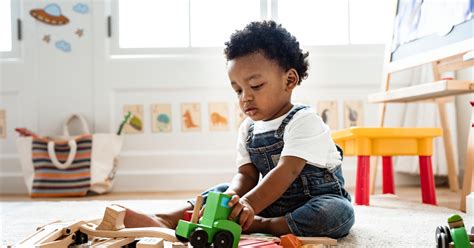 When Do Babies Really Start Playing With Toys An Expert Explains