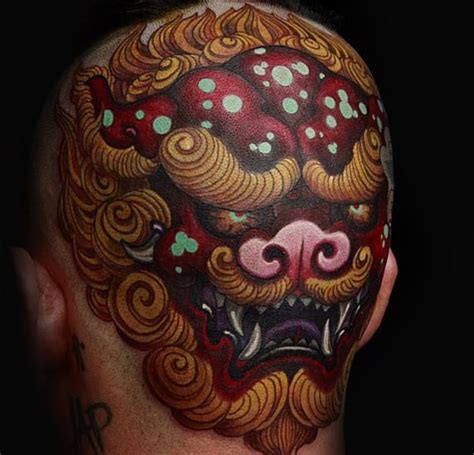 Tribal bulls head taurus tattoo for men on upper arm. 100 Head Tattoos For Men - Masculine Ink Design Ideas