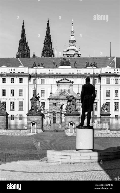 Hradcany Square With Entrance Gate To Prague Castle And Statue Of Tomas