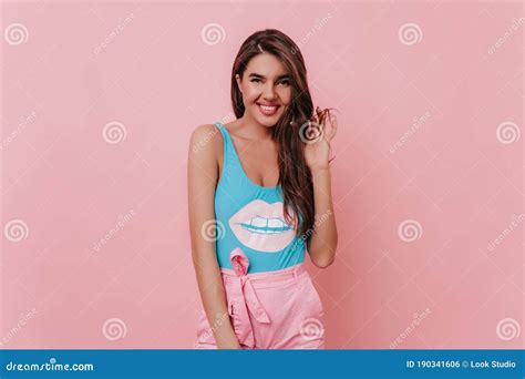Pleased White Girl In Bright Clothes Posing With Smile Indoor Portrait Of Inspired Female Model