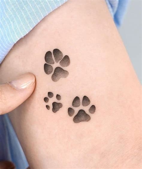 30 Dog Paw Tattoos How To Get A Dog Paw Tattoo In 2022 Dog Paw
