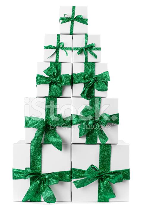 Green And White Presents Stacked Up Like A Christmas Tree Stock Photo