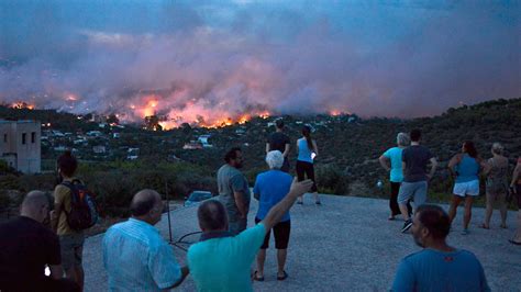 at least 74 killed by greek forest fires financial times