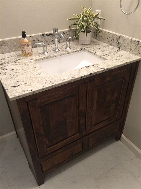 Granite Counter Top Single Vanity With Stained Knotty Alder Bathroom